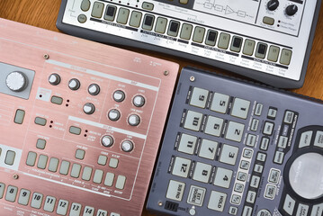 Top view of electronic synthesizer, drum machine and sampler. Studio equipment and devices for...