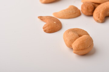 Fototapeta na wymiar Heap of cashew nuts isolated on white background.
