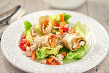 Chicken Sandwich Wrap on a plate. High quality photo.