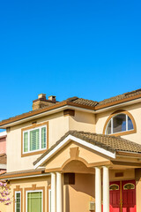 The roof of the house with nice window.