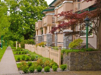 Fototapeta na wymiar Friendly neighborhood of townhouses in North Vancouver, Canada.