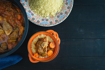 Lamb with couscous on black background. Copy space. Ramadan.