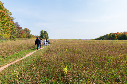 Family walking on a outdoor nature trail in Leland, Michigan