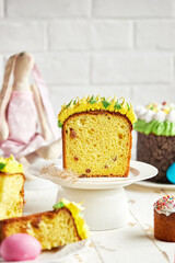 Happy Easter, traditional Easter cake, colored eggs. Sweet table for the holiday.