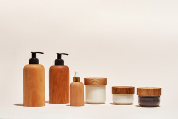Cosmetics for daily care in different bottles and containers