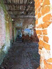 An old abandoned building on a sunny day.