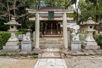 Foto op Aluminium Stone torii gate, Japanese religion Shinto Shrine or Jinja, for prayers and praying.  © Red Pagoda