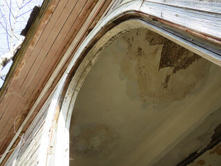 An old abandoned building on a sunny day.