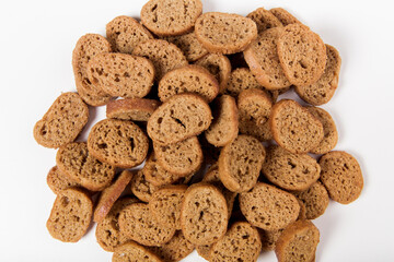 hard chucks snack on a white background. crackers, crunches. top view