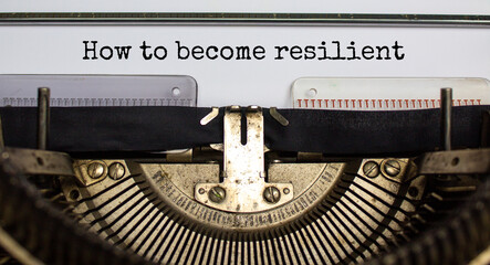 How to become resilient symbol. Concept words 'How to become resilient' typed on retro typewriter. Business, motivational and how to become resilient concept.