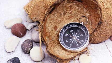 Coconut peel compass and stones, travel