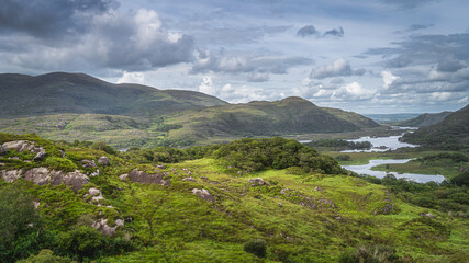 Irish iconic viewpoint, Ladies View and Lakes of Killarney. Valley and rocky mountains with...