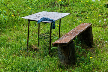 homemade table and bench in the garden