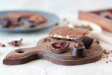 Chocolate, sweets and spices on linen fabric, top view, home cooking, sweet food