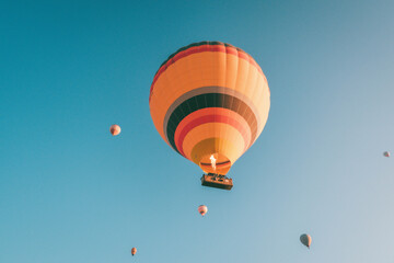 Hot air balloon on a sunny day over Cappadocia