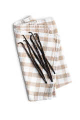 Vanilla pods on checkered napkin. Sticks of vanilla