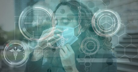 Body scan over caucasian woman putting mask in a city, coronavirus and medical technology concept