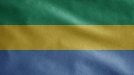 Gabonese flag waving in the wind. Gabon banner blowing soft silk.