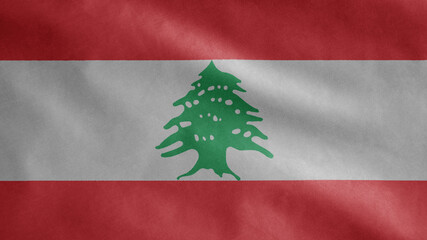 Lebanese flag waving in the wind. Close up of Lebanon banner blowing soft silk.