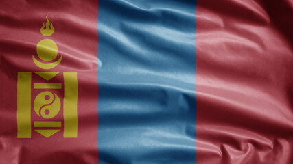 Mongolian flag waving in the wind. Close up of Mongolia banner blowing soft silk