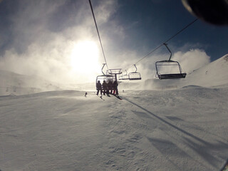 a ski lift in the sunlight
