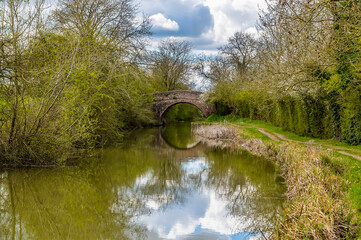 Reflections on the Grand Union Canal near to Smeeton Westerby, UK on a Spring day
