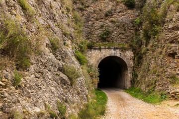 Fototapeta na wymiar Tunnel in the old train track near the Serpis River in Villalonga.