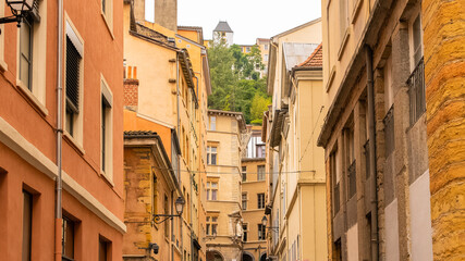 Fototapeta na wymiar Lyon, typical street in the center, with colorful buildings 