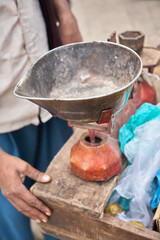Empty vegetable and fruit scales at a market. Normal perspective. Bananas, apples, mangoes,...