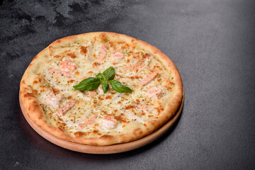 Delicious fresh seafood oven pizza: red fish and shrimp