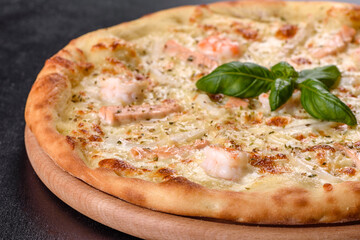 Delicious fresh seafood oven pizza: red fish and shrimp