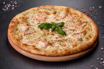 Delicious fresh seafood oven pizza: red fish and shrimp