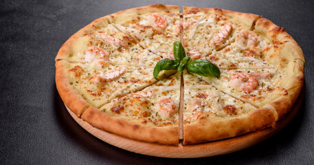 Delicious fresh seafood oven pizza: red fish and shrimp