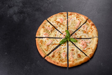 Delicious fresh seafood oven pizza: red fish and shrimp