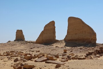 Fototapeta na wymiar The walls and ruins of Dimeh el Sibaa (Soknopaiou Nesos) in Fayoum city desert in Egypt