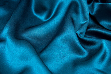 Fototapeta premium Smooth elegant blue silk can use as background