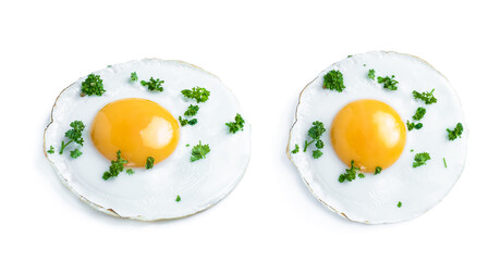Fried egg with herbs isolated on white background on top and side view