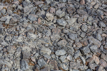 Untreated rough natural stone in everyday environment, gardening and landscaping
