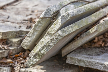 Untreated rough natural stone in everyday environment, gardening and landscaping