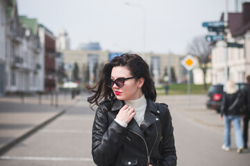 lifestyle fashion portrait of young stylish hipster woman