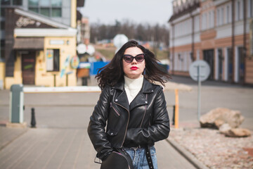 Naklejka na ściany i meble lifestyle fashion portrait of young stylish hipster woman