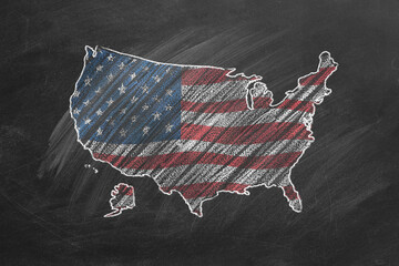 Country map and flag of the USA drawing with chalk on a blackboard.  One of a large series of maps and flags of different countries. Education, travel, study abroad concept.
