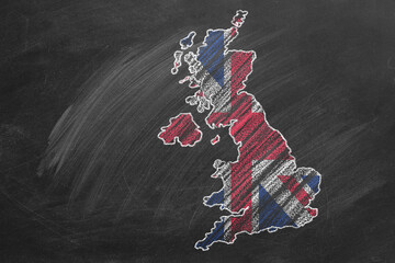 Country map and flag of United Kingdom drawing with chalk on a blackboard. Hand drawn animation. One of a large series of maps and flags of different countries. Education, travel, study abroad concep
