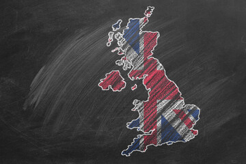 Country map and flag of United Kingdom drawing with chalk on a blackboard. Hand drawn animation. One of a large series of maps and flags of different countries. Education, travel, study abroad concep

