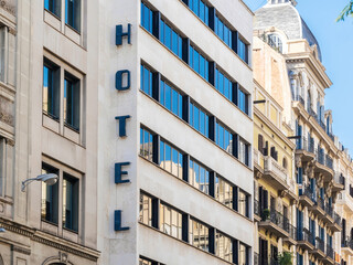 Vintage 70s building with Hotel lettering inscription signage in the Catalan capital Barcelona