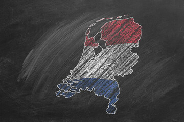 Country map and flag of The Netherlands drawing with chalk on blackboard. Hand drawn animation. One of a large series of maps and flags of different countries. Education, travel, study abroad concept
