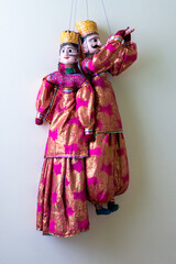 Asian dolls with traditional colouring clothes
