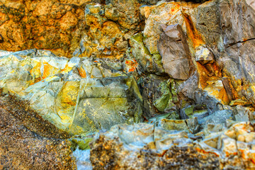 Colorful and vibrant stone textures on the wall