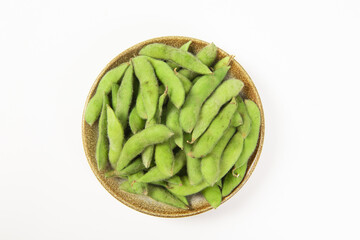fresh green soybeans on white background.