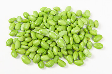 fresh green soybeans on white background.